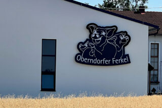 Leuchtschild Logoform Oberndorfer Wand