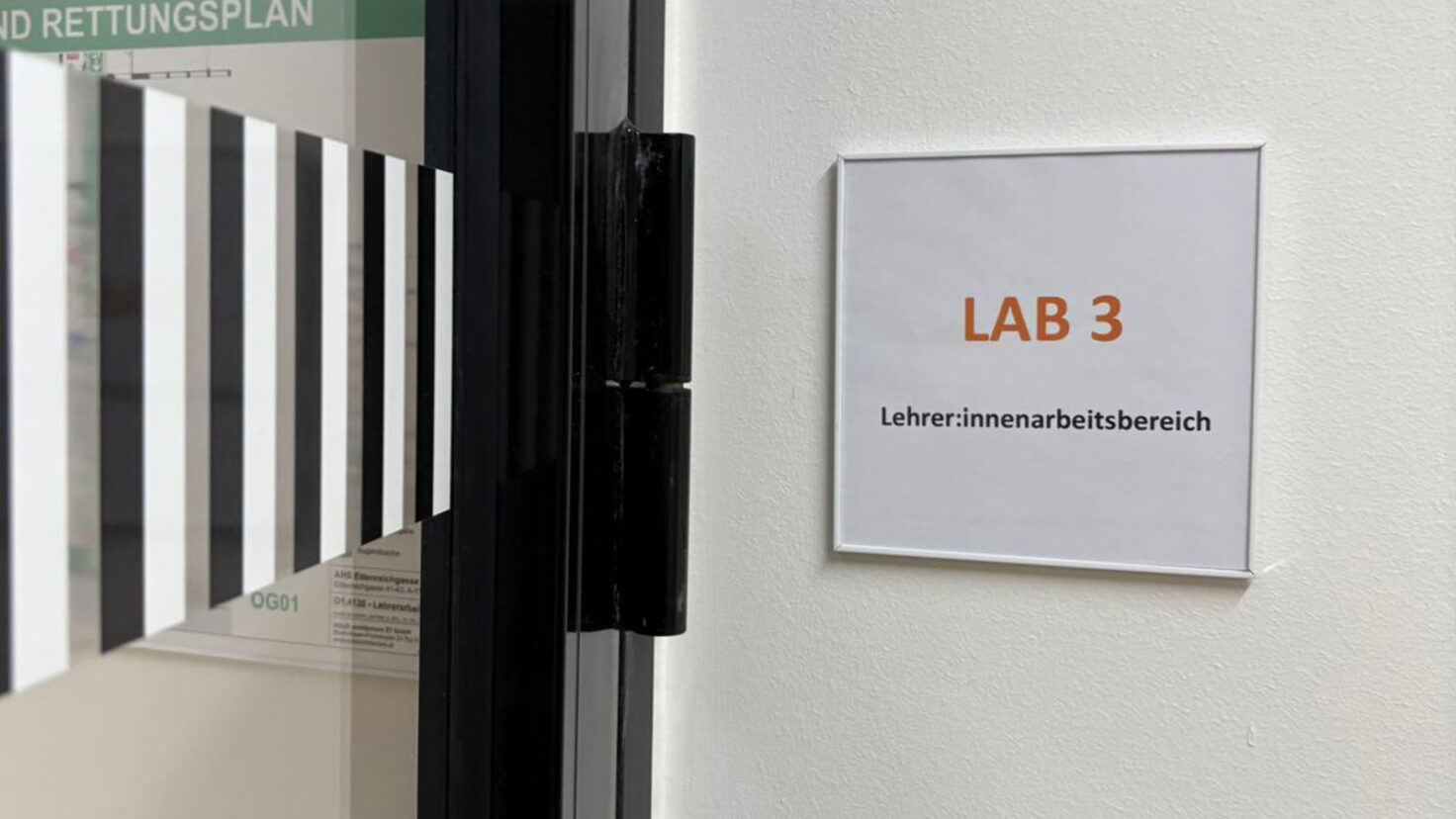 AHS Ettenreichgasse Türschild